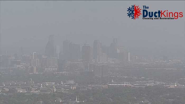 dust near Dallas buildings